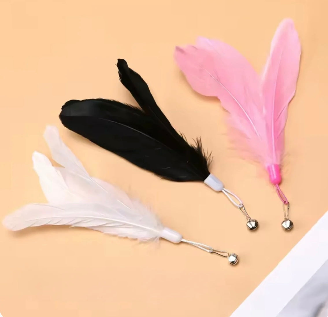 Juguete varita con plumas para gatos
